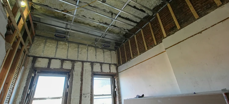 Smooth ceiling after asbestos popcorn ceiling removal in a Mobile AL home