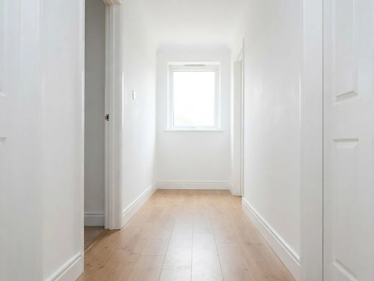 Water-Stained Drywall & Baseboard — after
