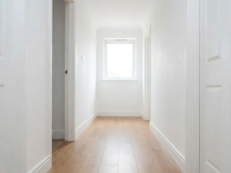Water-Stained Drywall & Baseboard — after