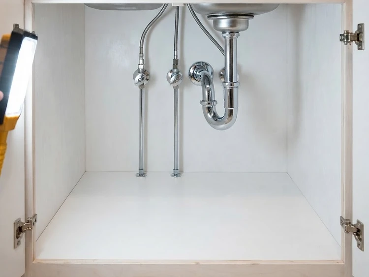 Swollen Sink Cabinet Base — after