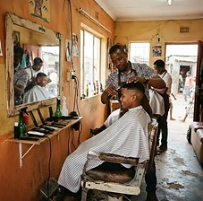 Barber cutting a client's hair in a local barber shop