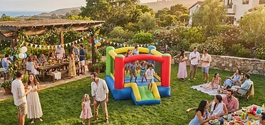 Bounce house at a sunny backyard party in Santa Maria, CA