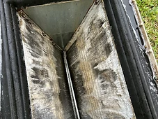 Dirty evaporator coil removed from an HVAC system before a deep cleaning in Miami-Dade County