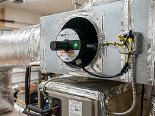 REME HALO whole-home air purification system installed in an HVAC duct plenum in Broward County