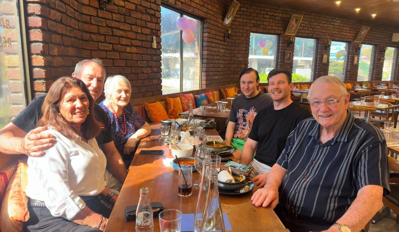 Group of friends sharing a meal together
