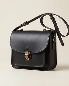 The Mercer Espresso Black leather crossbody bag