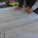 Reviewing blueprints on the job site