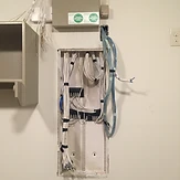 Structured wiring enclosure with low-voltage cabling