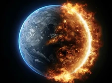 Earth seen from orbit against deep space, one hemisphere in shadow and the other engulfed in glowing flames