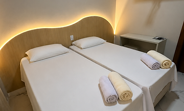 Quarto com camas de solteiro