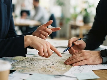 Hands and gestures during a business discussion.