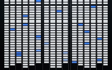 Abstract editorial artwork: a grid of documentation field cells with a few highlighted in electric blue on a black background.