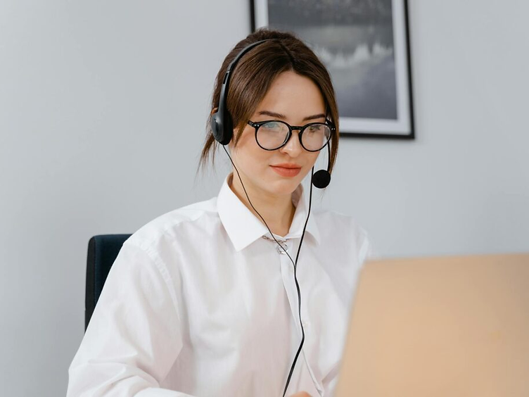 Copybox customer service representative wearing a headset