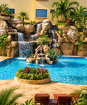 Cascading waterfalls into the La Pina Spa pool