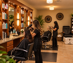 Beauty salon with styling stations and vanity mirrors