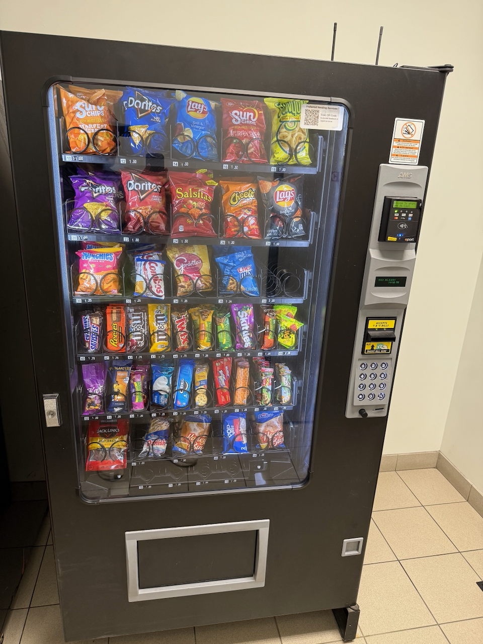 Modern snack vending machine stocked with popular snacks for businesses in Aurora Illinois