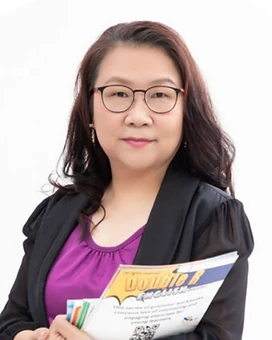Rowena Tam, Founder & Chairlady of HKETSA, holding Double R English workbooks