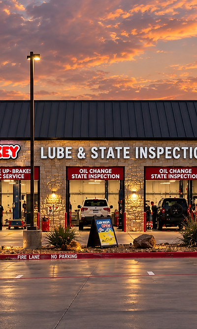 Grease Monkey quick-lube shop at sunset