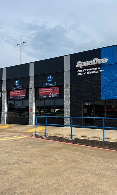 Freshly painted SpeeDee Oil Change & Auto Service storefront