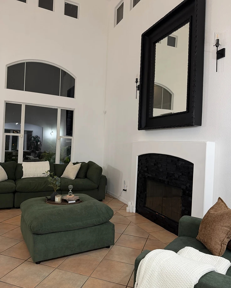 Freshly painted living room with arched window