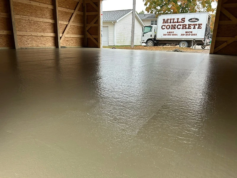 Massive freshly poured concrete foundation at golden hour
