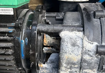 Corroded pump housing found on a callout