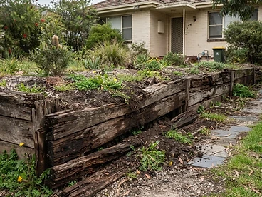Before — Limestone Retaining Wall