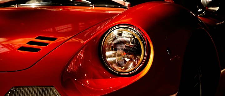 An automotive detail, photographed with moody, directional light.