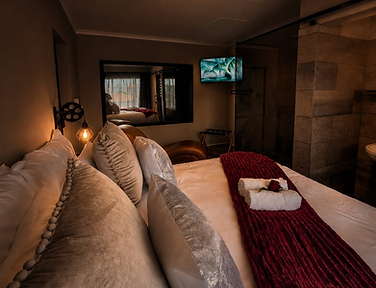 The Private Love Nest at Rudman Townhouses set for a romantic evening with warm ambient lighting