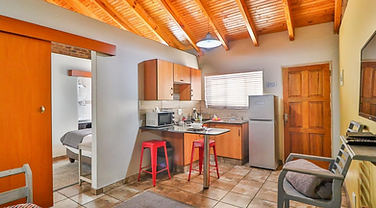 D Block kitchenette with bar seating at Rudman Townhouses
