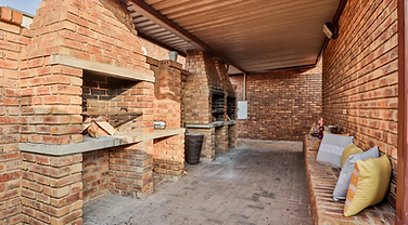 F Block covered built-in braai area at Rudman Townhouses