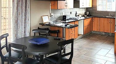 Kitchen and dining area in the two-bedroom unit at Rudman Townhouses