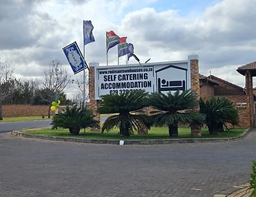 Rudman Townhouses self-catering accommodation signage