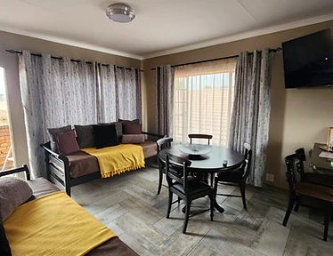 Living and dining area in a Rudman Townhouses unit