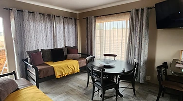 Living and dining area in a Rudman Townhouses unit