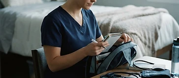 A student nurse preparing for a shift.