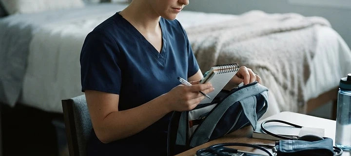 A student nurse preparing for a shift.
