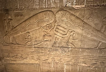 Carved relief with serpent deity