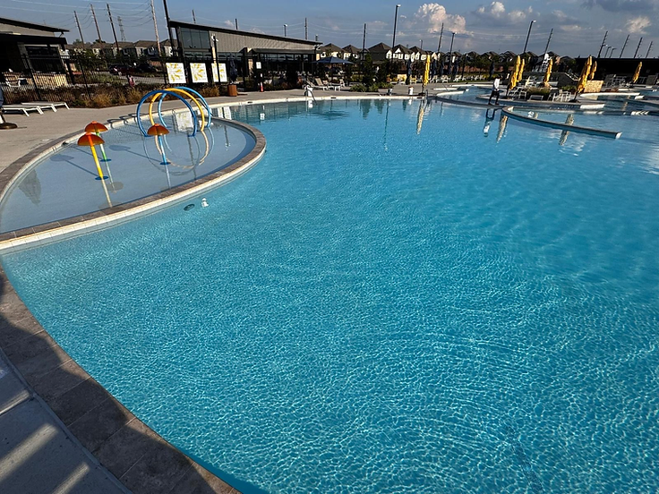 Large swimming pool with a shallow entry area