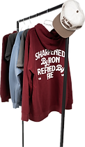Iron & Embers apparel on a rack, including a burgundy hoodie and cream cap
