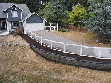 White-Framed Wire Fence & Retaining Wall — client project photo