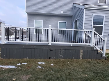 Composite Deck with White Vinyl Rail & Skirted Base