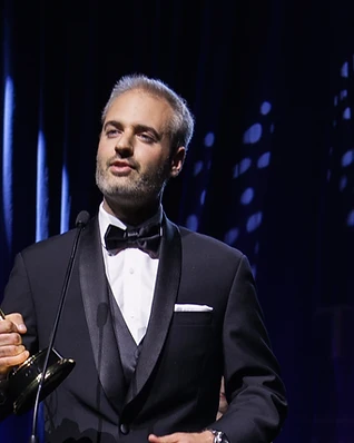 Nathan Pangrazio with his Emmy Award