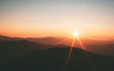 The Benefits and Risks of Sunshine While on Summer Vacation