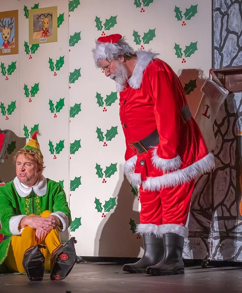 Elf cast members performing on stage
