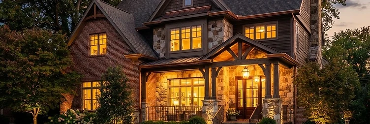 A luxury Columbus, Ohio home glowing at dusk