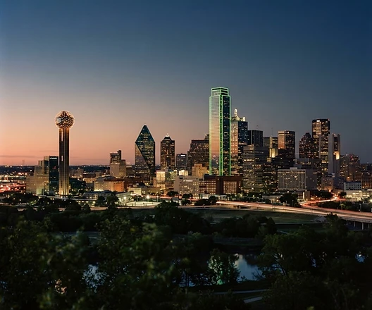 Illustrative Dallas skyline at dusk