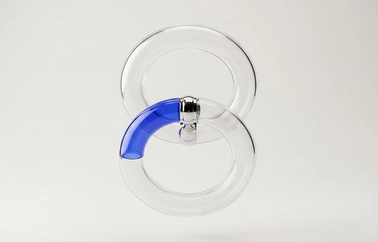 Interlocking transparent and cobalt glass loops