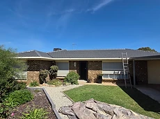 Tiled roof restoration with ladder access