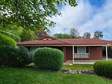 Completed red tiled roof restoration